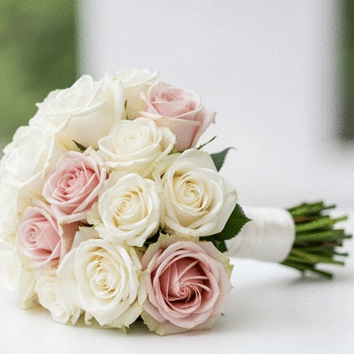 Elegant bridal bouquet with classic white and blush roses, soft lighting, no text, no words, no typography, clean image